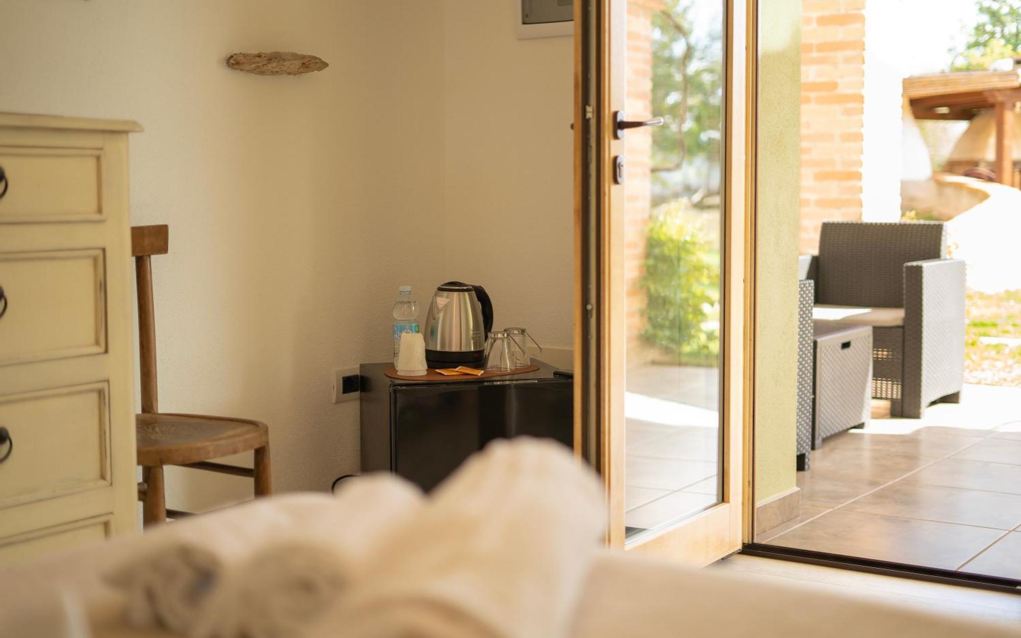 Hotel Essenza Di Mirto La Caletta Rom bilde