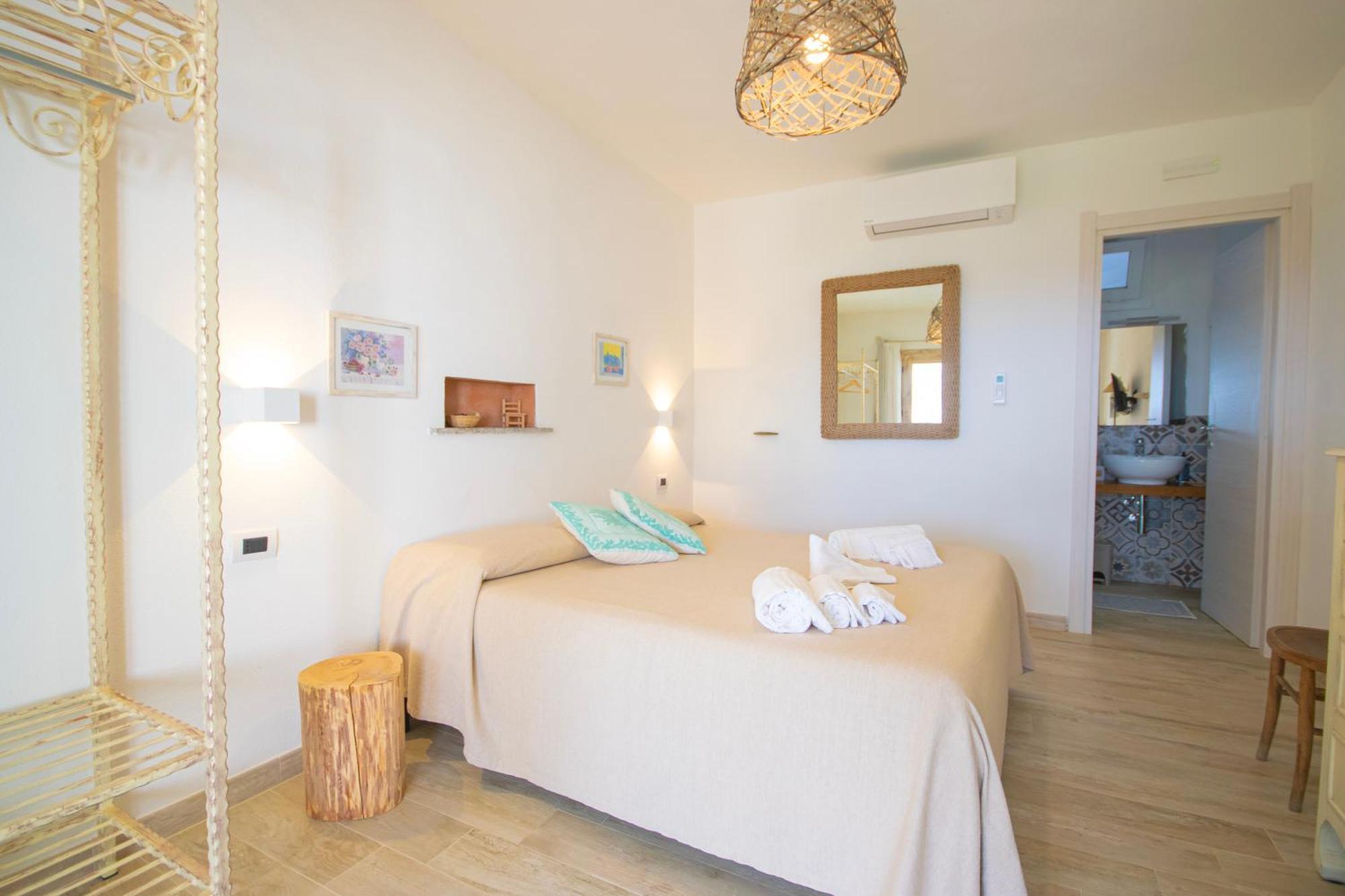 Hotel Essenza Di Mirto La Caletta Rom bilde