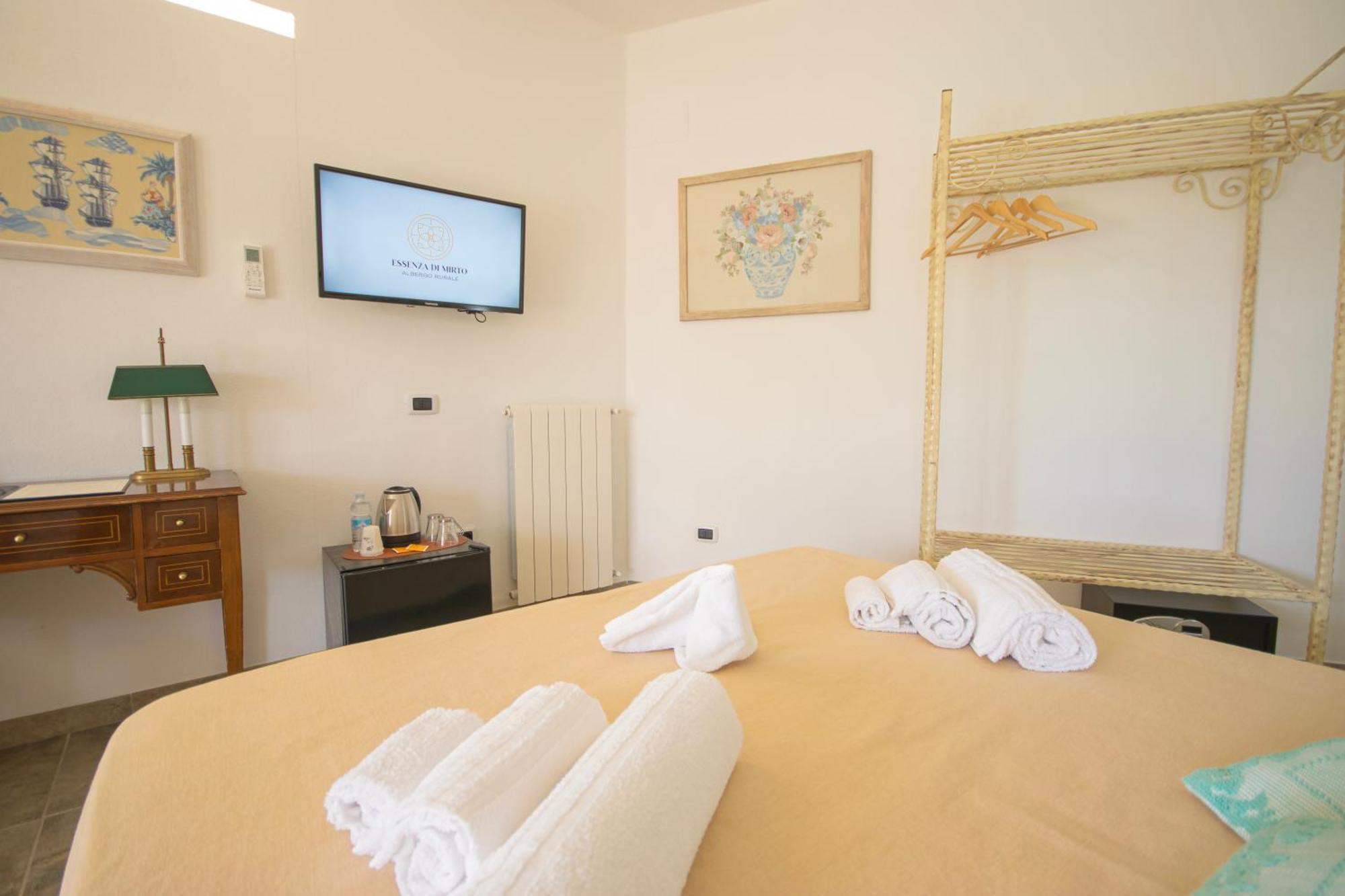 Hotel Essenza Di Mirto La Caletta Rom bilde