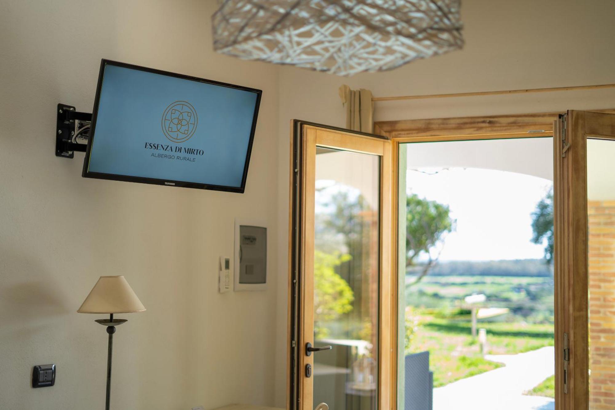 Hotel Essenza Di Mirto La Caletta Rom bilde