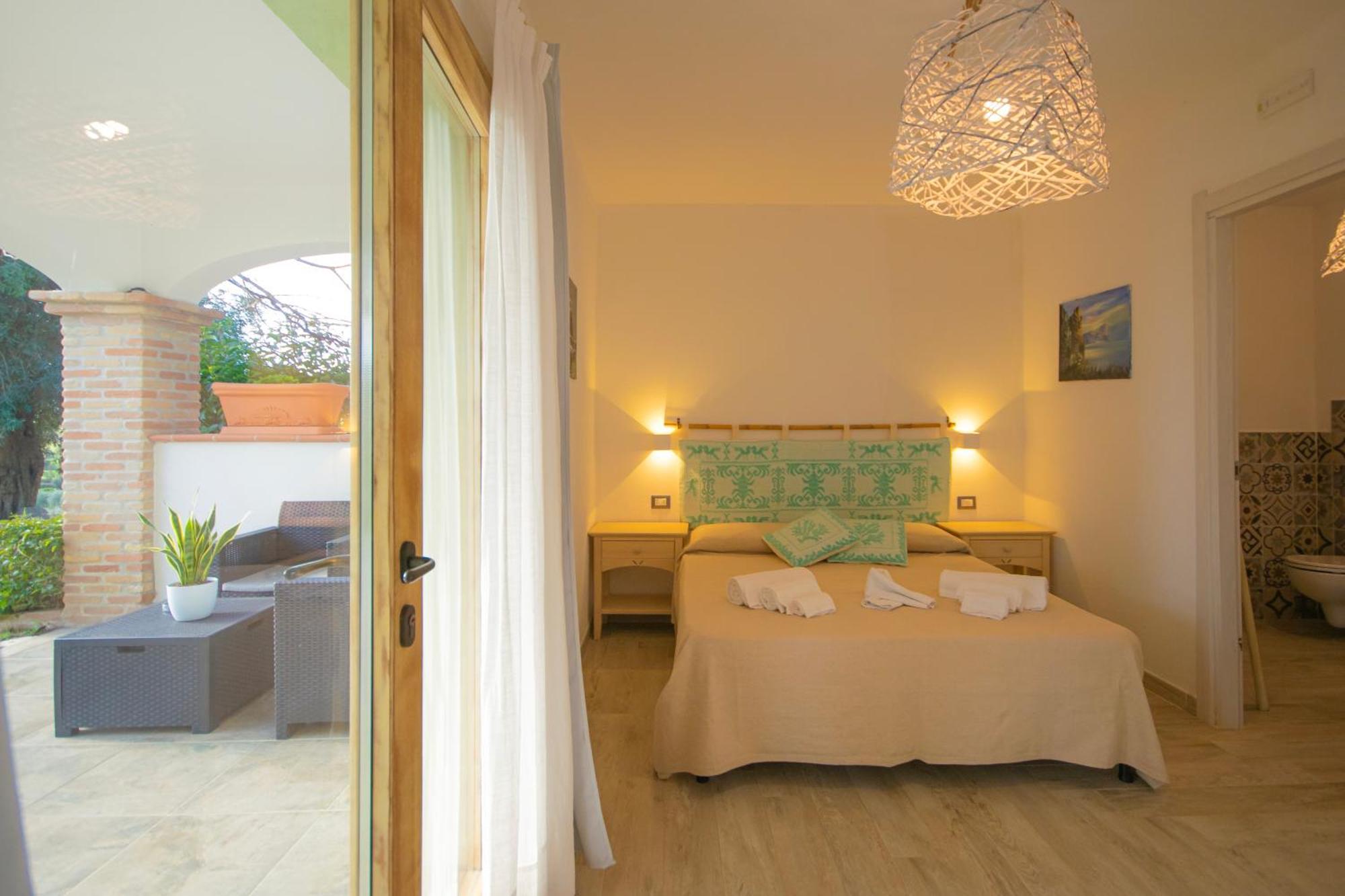 Hotel Essenza Di Mirto La Caletta Rom bilde