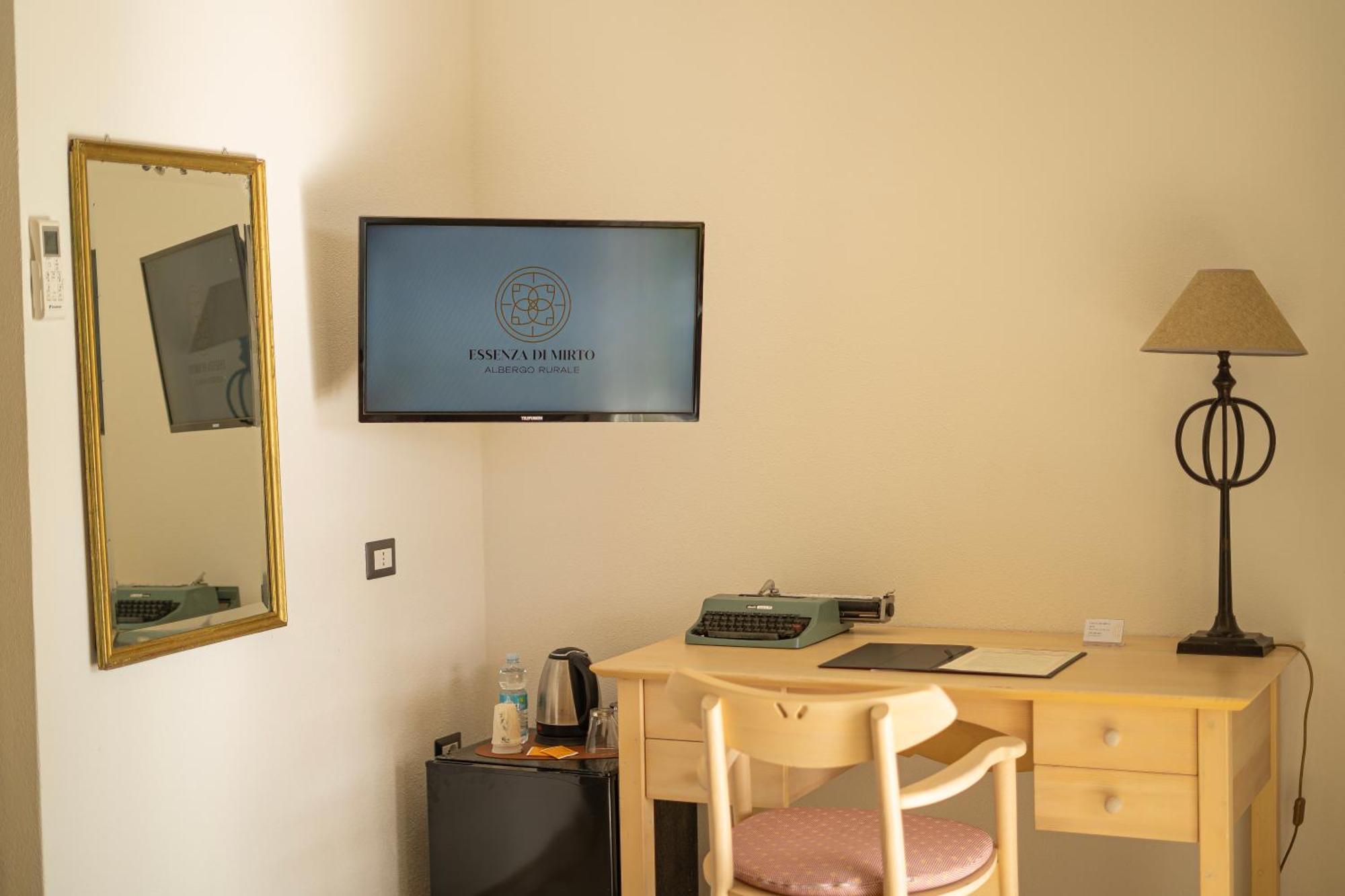 Hotel Essenza Di Mirto La Caletta Rom bilde