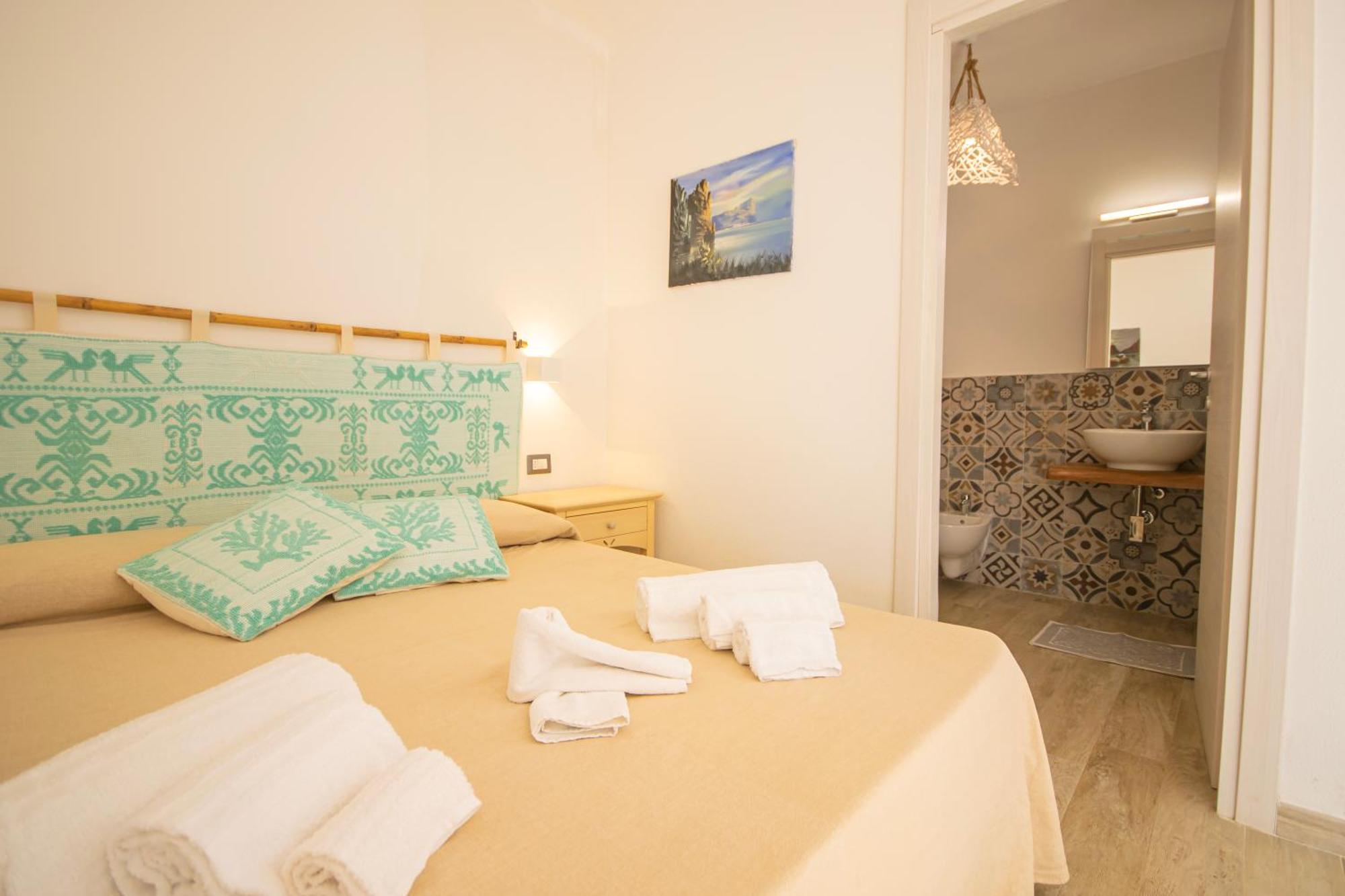 Hotel Essenza Di Mirto La Caletta Rom bilde